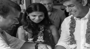 rishi-sunak-rishi-sunak-enters-pm-house-with-a-garland-of-marigolds-around-his-neck